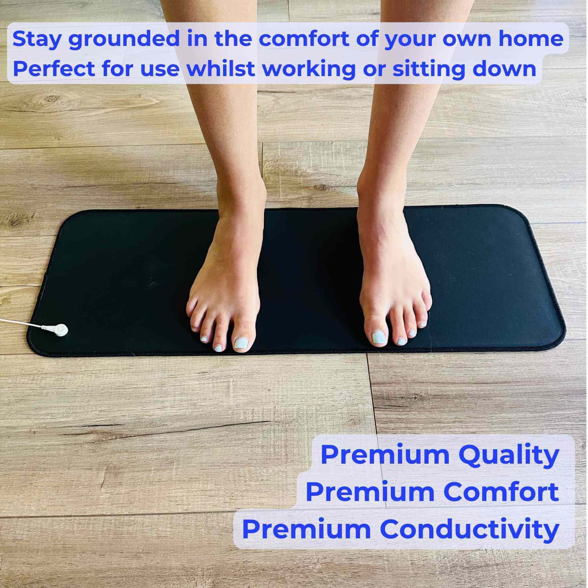 feet standing on grounding mat